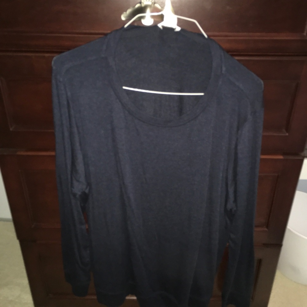 Tunic with zippers at waist and 1/2 way up on side